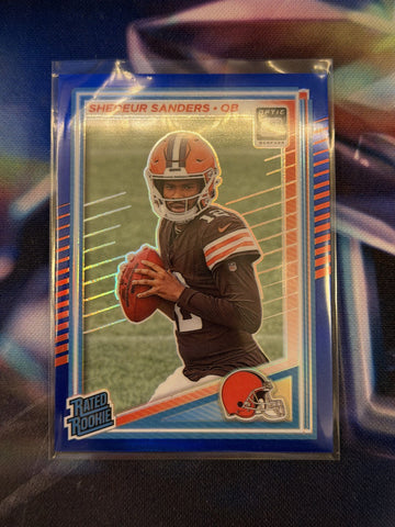 2025 NFL Panini Donruss Optic - Shedeur Sanders - Rated Rookie Blue Prizm Limited to /249 - Browns - Raw Ungraded Card